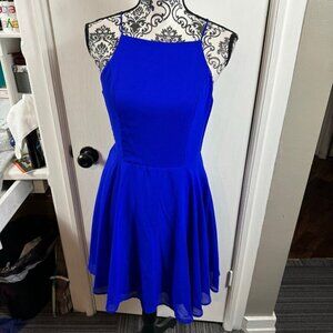 Charlotte Russe cobalt blue scrappy back fit in flare open back dress.
